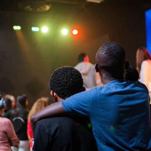 Boys watching music ministry in youth group